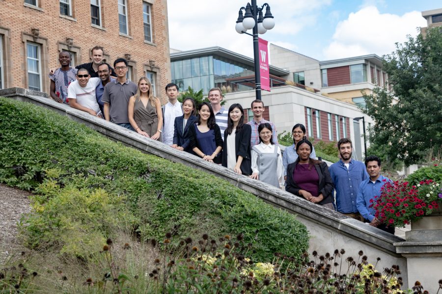 students posing on stairs